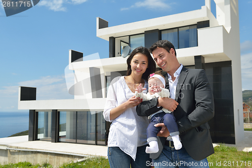 Image of happy young family at home