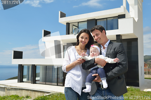 Image of happy young family at home