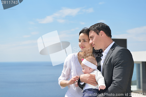 Image of happy young family at home