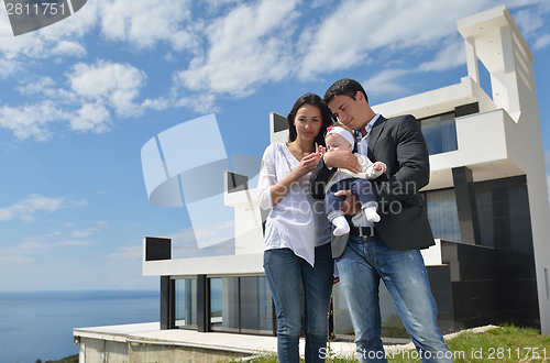 Image of happy young family at home