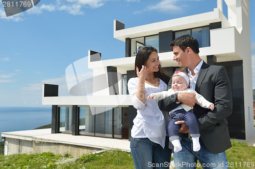 Image of happy young family at home