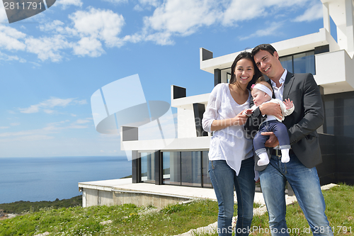 Image of happy young family at home