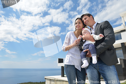 Image of happy young family at home