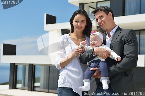 Image of happy young family at home