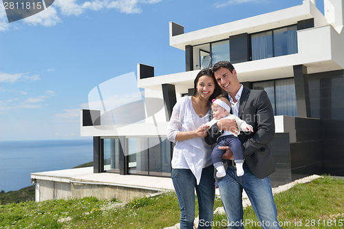 Image of happy young family at home