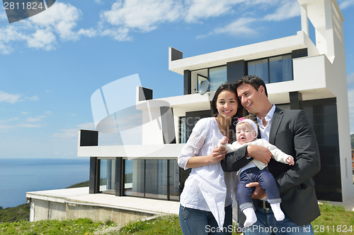 Image of happy young family at home