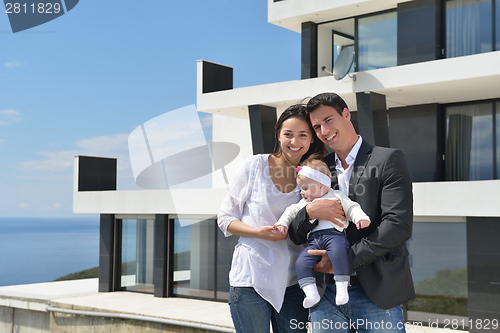 Image of happy young family at home