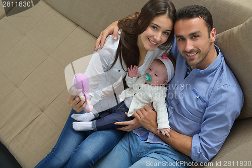 Image of happy young family at home