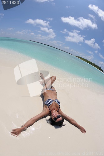 Image of beautiful young woman  on beach have fun and relax
