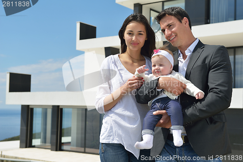 Image of happy young family at home