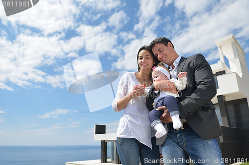 Image of happy young family at home