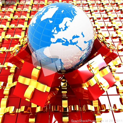 Image of Traditional Christmas gifts and earth. Global holiday concept 