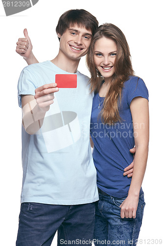 Image of Happy couple with credit card