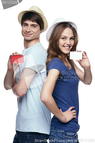 Image of Happy couple showing credit cards