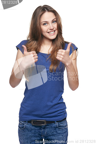 Image of Smiling emotional girl pointing to the side