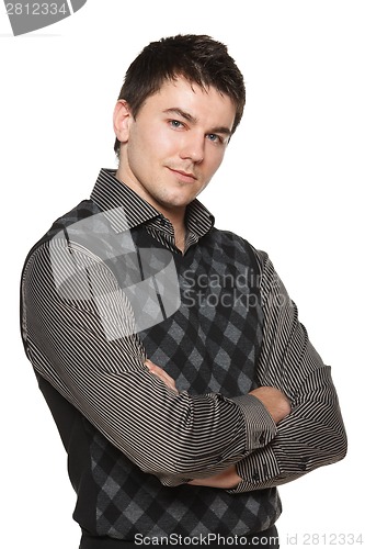 Image of Attractive young man looking calm and confident