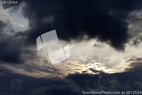 Image of Storm clouds on sky in evening