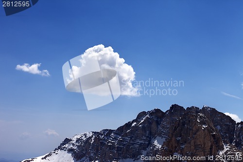 Image of Blue sky with clouds and snow rocks