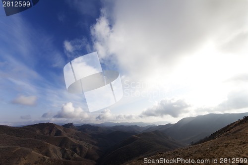 Image of Mountains and blue sky with clouds