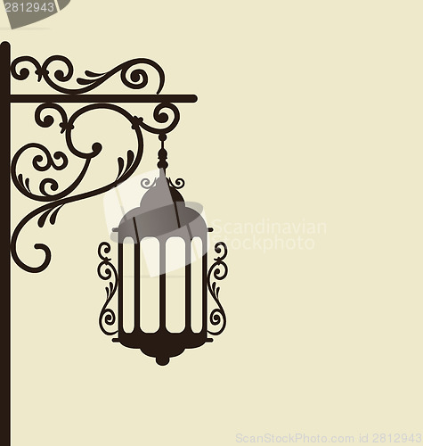 Image of Vintage forging ornate street lantern isolated