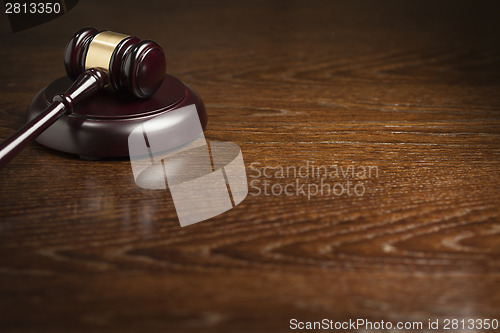 Image of Wooden Gavel Abstract on Table