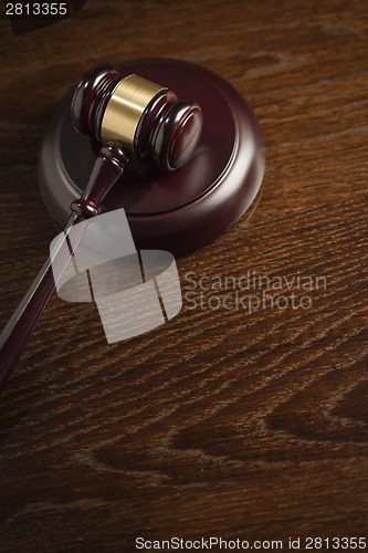 Image of Wooden Gavel Abstract on Table