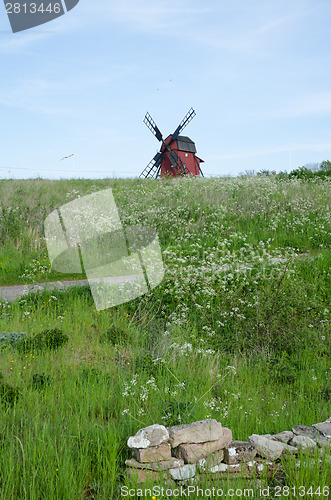 Image of Landscape with cow parsley and an old wooden windmill