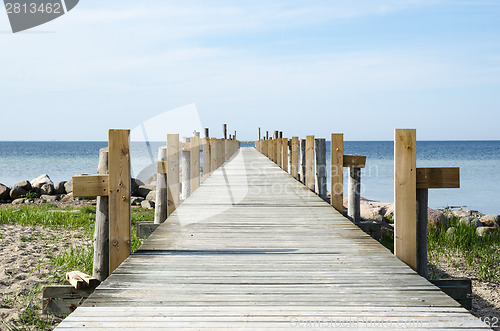 Image of Wooden bath pier by the coast