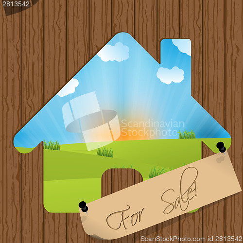 Image of For sale sign with house cutout