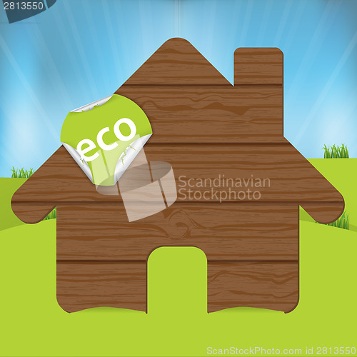 Image of Wooden house sign with eco label