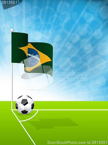 Image of Soccer ball and Brazil flag