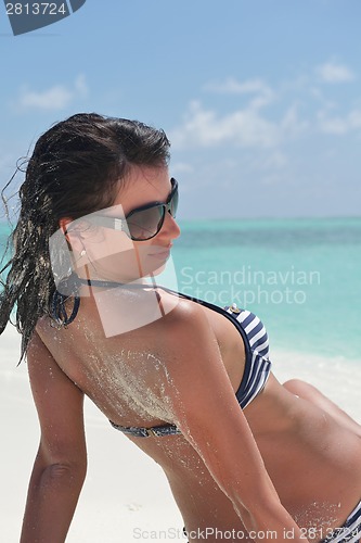 Image of beautiful young woman  on beach have fun and relax