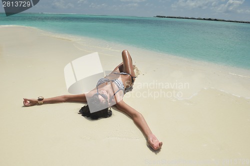 Image of beautiful young woman  on beach have fun and relax