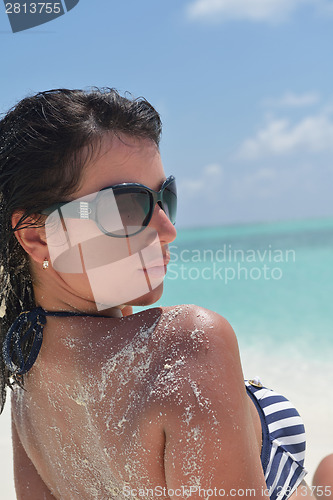 Image of beautiful young woman  on beach have fun and relax