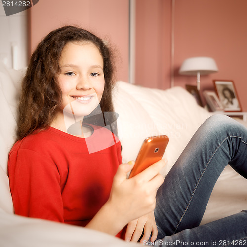 Image of young girl mobile phone
