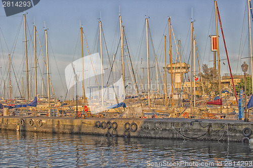 Image of Sailing and engine boats in the harbour channel