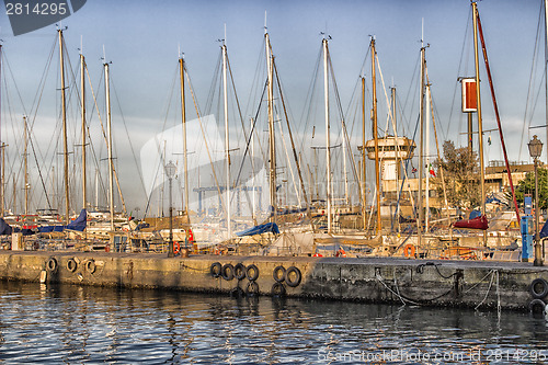 Image of Sailing and engine boats in the harbour channel