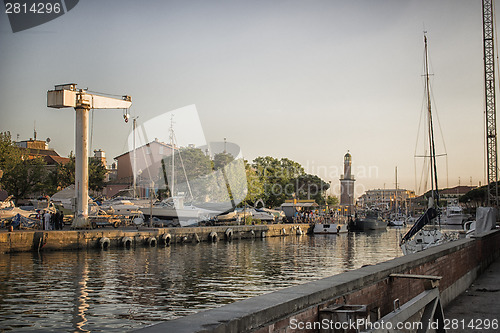 Image of Sailing and engine boats in the harbour channel