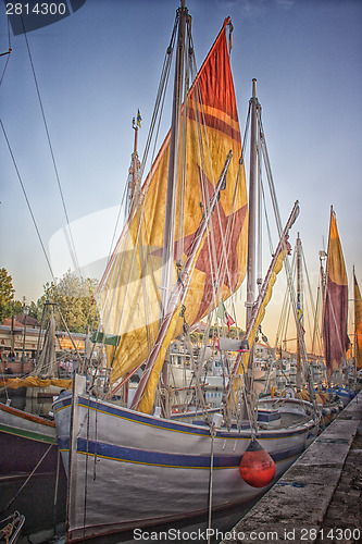 Image of Sailing and engine boats in the harbour channel