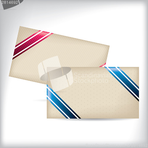 Image of Striped and dotted business cards with ribbons