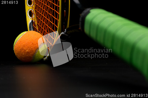 Image of Tennis ball for kids with tennis racket