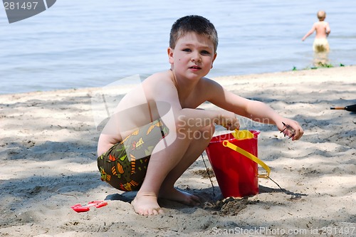 Image of Playing in the sand