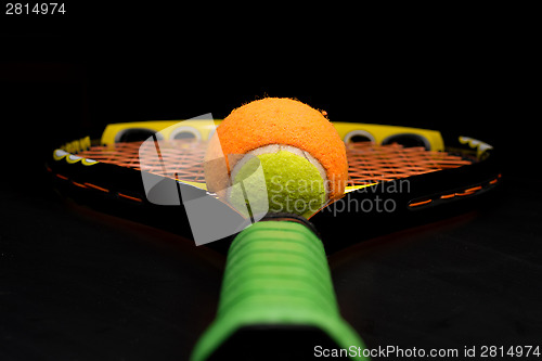 Image of Tennis ball for kids with tennis racket