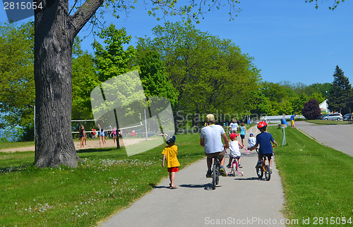 Image of Family on bikes.