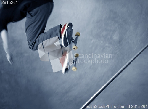 Image of Skateboarder doing a trick 