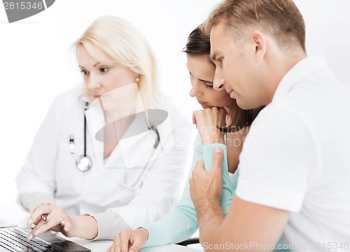 Image of doctor with patients in hospital