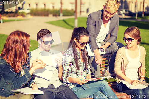 Image of group of students or teenagers hanging out