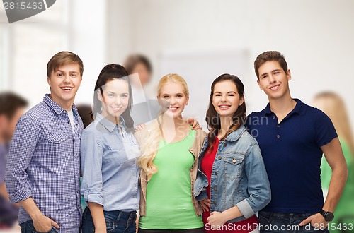 Image of group of standing smiling students