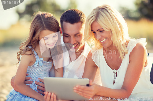 Image of happy family with tablet pc taking picture