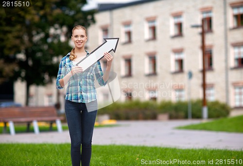 Image of smiling young woman with arrow poiting up